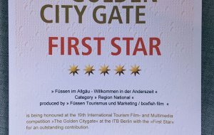 Urkunde zur Auszeichnung „Das Goldene Stadttor“ © Füssen Tourismus und Marketing